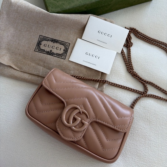 Gucci Handbags - NWT Authentic Gucci GG Marmont Matelassé Super Mini Bag - Tone-on-Tone Hardware